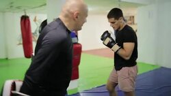 Two men having boxing workout indoors Stock Footage