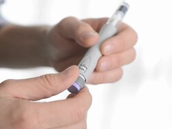 Man using insulin pen Stock Footage