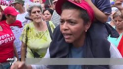 VOICED : Chavistas se manifiestan en apoyo a presidente Maduro News Clip
