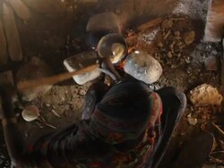 Woman stirring pastry of Ethiopian dish Stock Footage