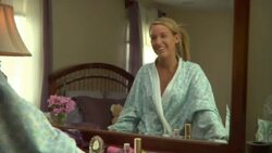 MS, Reflection of teenage girl (16-17) in dressing gown standing in front of mirror, Edison, New Jersey, USA Stock Footage