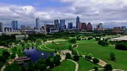Spring time Bliss Austin Texas Over Downtown Modern Parks and Skyline Stock Footage