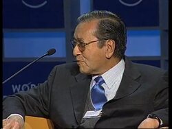 WEF meeting Including  Ashcroft, Mahathir, Uribe and Cox plus protest News Clip