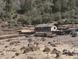 MS ZI Shot of Small stone Sherpa House near Lukla / Lukla, Khumbu Region, Nepal Stock Footage