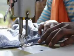 Girl sewing with sewing machine Stock Footage