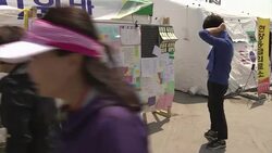 Angry relatives of missing from ferry disaster detain fisheries minister and coast guard News Clip