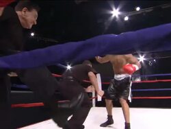 LA WS Boxer jumping around ring with his trainers, then one man lifts him up / Jacksonville, Florida, USA Stock Footage