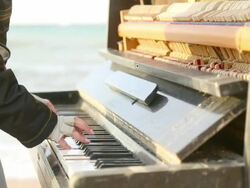 pianist and an old piano Stock Footage