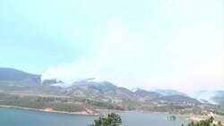 Firefighters battle out of control wildfire News Clip