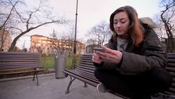 Woman using smartphone Stock Footage
