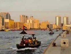 T/L of abra water taxis on the Dubai creek in the United Arab Emirates. Stock Footage
