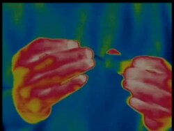 Thermographic image, CU hands strikes a match, identical shots with info bar on DB 302 Stock Footage