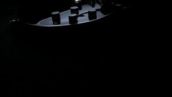 Electric Guitar On Black Background. Tracking Shot Stock Footage