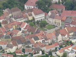 MS AERIAL ZI Shot of buildings with car parking area at Stolpen / Germany Stock Footage