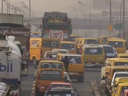 MS Road with back yellow cabs changing lines / Lagos, Nigeria Stock Footage