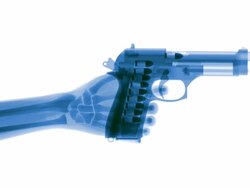 Blue X-ray hand firing gun in slow motion Stock Footage