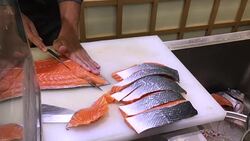 Salmon and sashimi raw food in Bangkok restaurant , Thailand Stock Footage