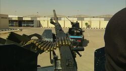 Armored trucks with gun turrets travel through a military base in Saudi Arabia. Stock Footage