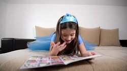 Girl reading book Stock Footage