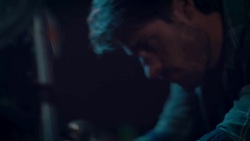 Man in motorcycle workshop building a bike Stock Footage