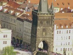 MS AERIAL PAN Shot of people walking on bridge / Prague, Czech Republic Stock Footage