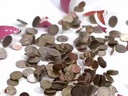 CU SLO MO Piggy bank falling down and Breaking / Vieux Pont, Normandy, France  Stock Footage