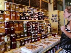 MS PAN Lady shopping in Atwater market and looking at local made jams / Montreal, Quebec, Canada Stock Footage