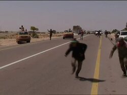 Rebel Convoy retreating from Brega News Clip
