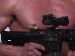 CU R/F SLO MO Shot of black African American male hand on trigger of MR27 machine gun in / Studio, New York, United States Stock Footage