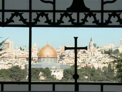 WS Dome of Mount of Olives seen through window with cross in Dominus Flevit Church / Jerusalem, Mechoz Jeruschalajim, Israel Stock Footage