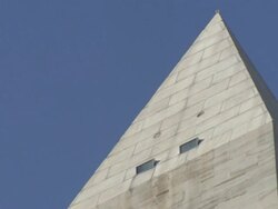 Low Angle static - A blue sky frames the top of the Washington Monument. / Washington, D.C., USA Stock Footage