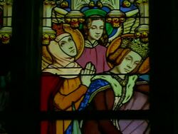 CU PAN Stained glass window of Joan of Arc / Orleans, France Stock Footage