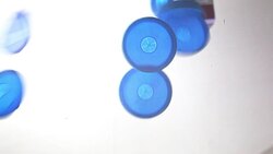 Recycling plastic caps falling down Stock Footage