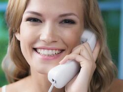 HD 1080@29,97: Woman on phone at home Stock Footage