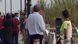 People strolling along Beirut coastal promenade News Clip