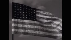 MS US Flag waving against sky / United States Stock Footage