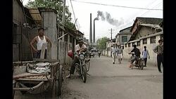 Porcelain factory and smoke chimney shots News Clip