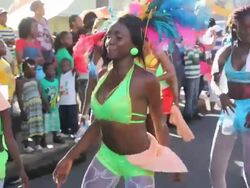 MS Shot of Woman Dancing in Caribbean Carnival AUDIO / Nevis, Saint Kitts and Nevis Stock Footage