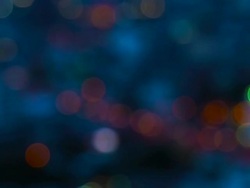 Pan across city blur background, Moving bokeh circles of night traffic Stock Footage