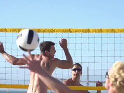 Men playing beach volleyball. - Slow Motion - filmed at 240 fps Stock Footage