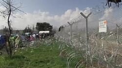 CLEAN : Migrants call for Germanys help at Greek Macedonia border (2) News Clip