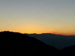 "Silhouetted mountain range, sun setting behind, blue and orange skies, Amazonas region of Peru [PerÃƒÂº]" Stock Footage
