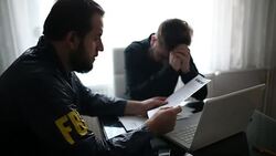 Fbi agent and businessman talking Stock Footage