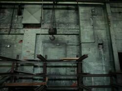 MS POV Hook hanging from ceiling in interior of rundown, vacant industrial warehouse building / Rutland, Vermont, United States    Stock Footage