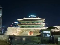 MS POV T/L View of Nightscape of Namdaemun(the first National Treasure of South Korea)door / Seoul, South Korea Stock Footage