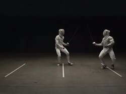 Fencer touches opponent causing him to loose his balance and the win Stock Footage