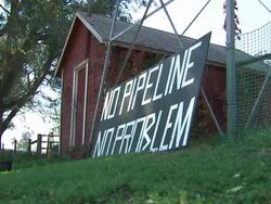 Protest sign against proposed XL Pipeline News Clip