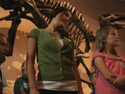 MS LA PAN Young woman with group of children (4-5, 6-7, 8-9) in natural history museum, Lehi, Utah, USA Stock Footage