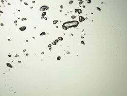 CU SLO MO Shot of bubbles moving up through frame / United Kingdom Stock Footage