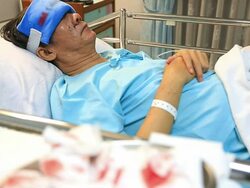 HD Tilt up crane shot: Patient in Hospital Stock Footage